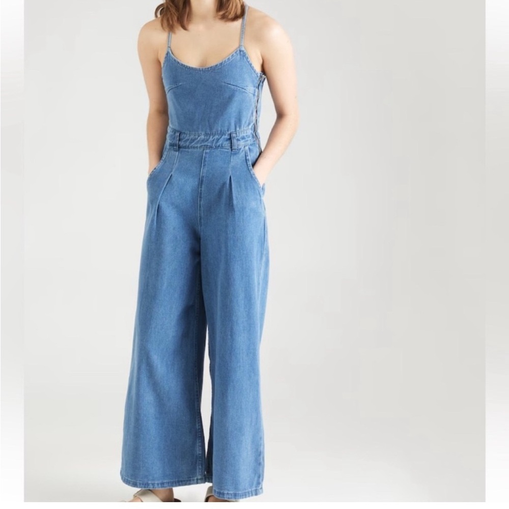 Molly bracken Denim wide leg jumpsuit. Open back.